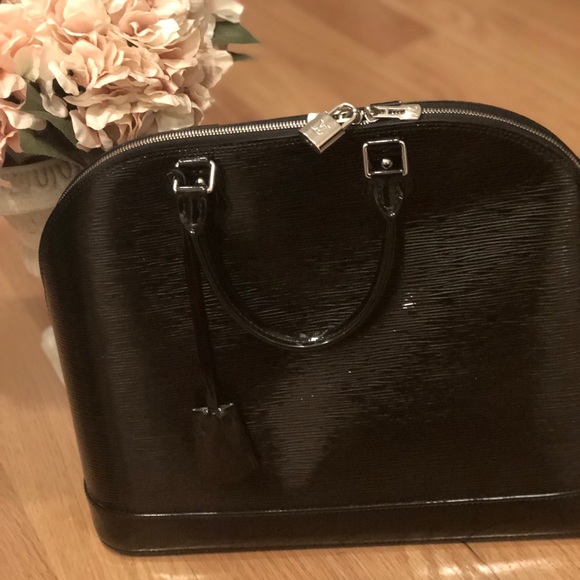 Louis Vuitton Handbags - Louis  Vuitton !Alma large but glossy leather .